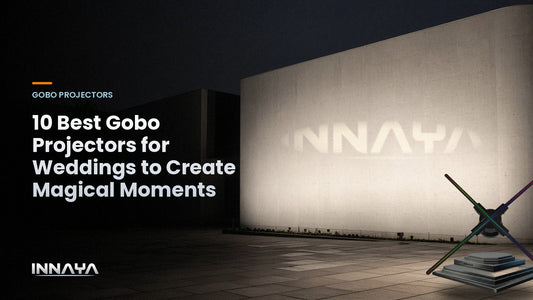 INNAYA logo projected by a gobo projector in a building facade at night, cover image for "10 Best Gobo Projectors for Weddings to Create Magical Moments"